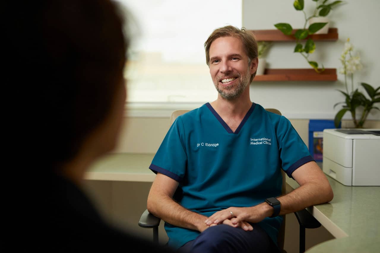 IMC Doctor in the mens health clinic during a consultation